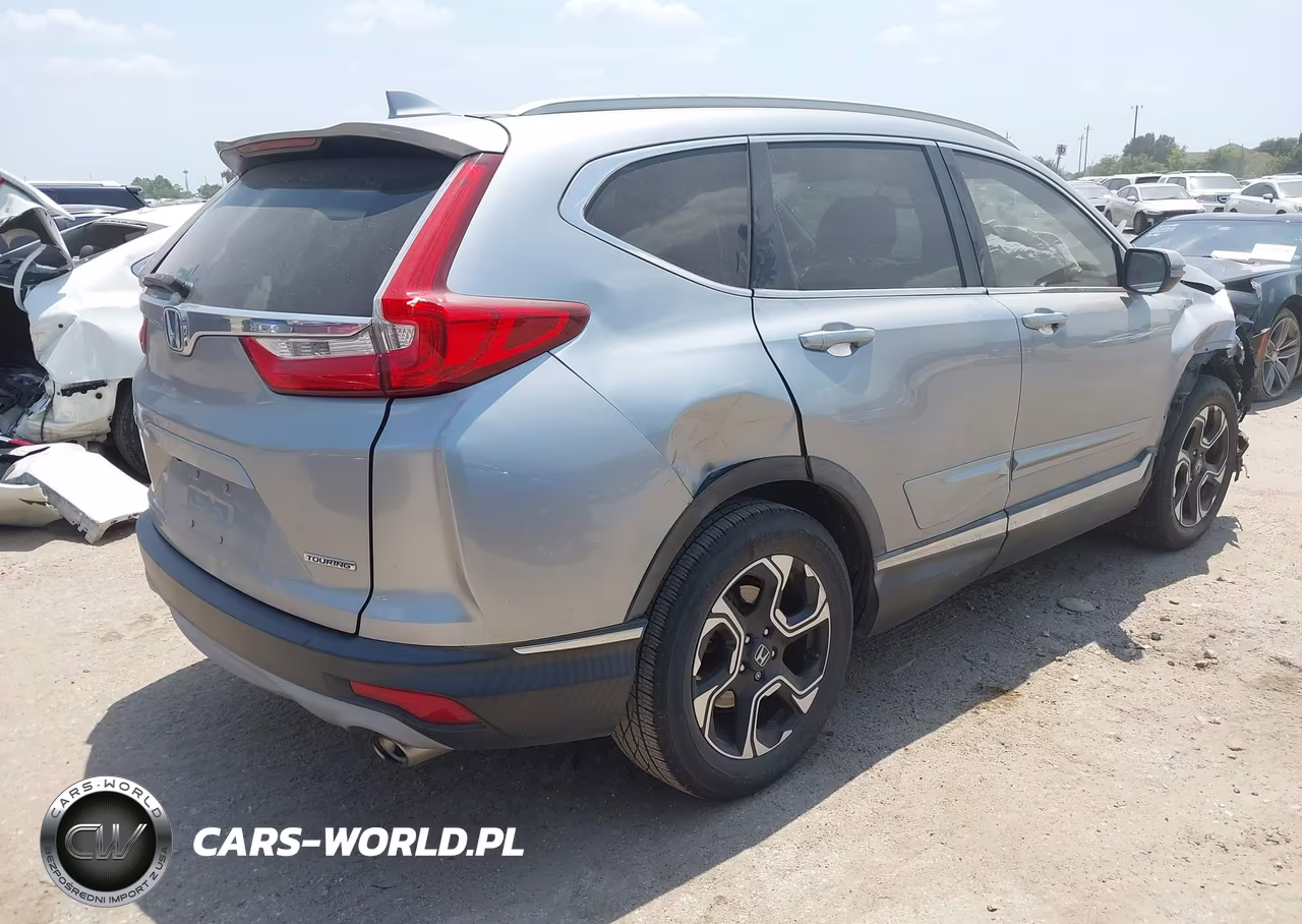 2017 Honda Cr-V Touring VIN:2HKRW1H96HH501102 - 4