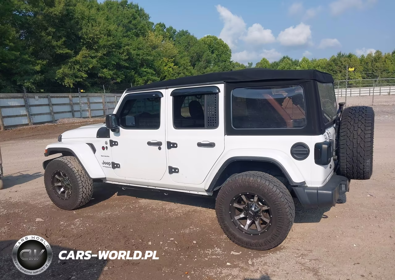 2019 Jeep Wrangler Unlimited Sahara 4X4 VIN:1C4HJXEN3KW576517 - 14