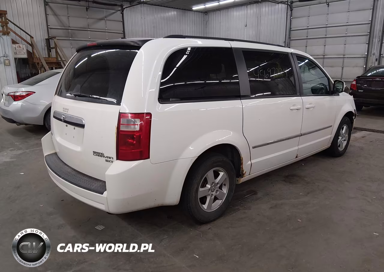 2010 Dodge Grand Caravan Sxt VIN:2D4RN5D18AR483336 - 4
