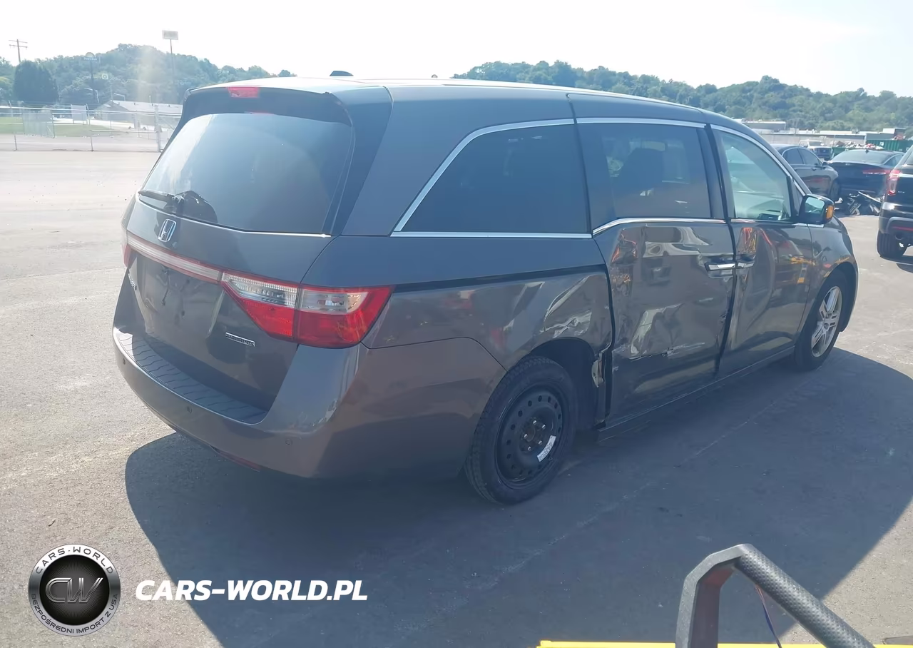 2011 Honda Odyssey Touring-Touring Elite VIN:5FNRL5H96BB092430 - 4