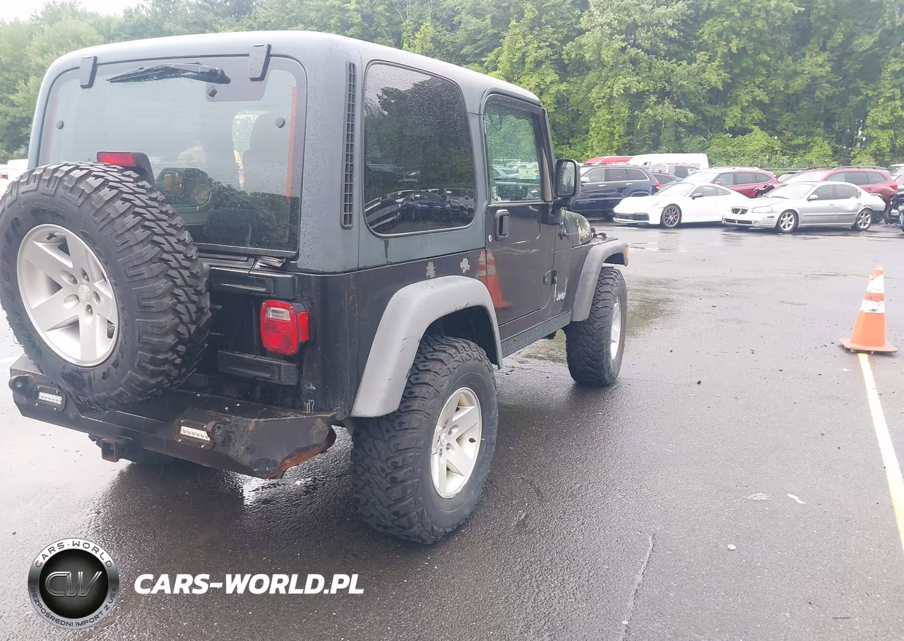 2005 Jeep Wrangler Rubicon VIN:1J4FA69S35P305788 - 4