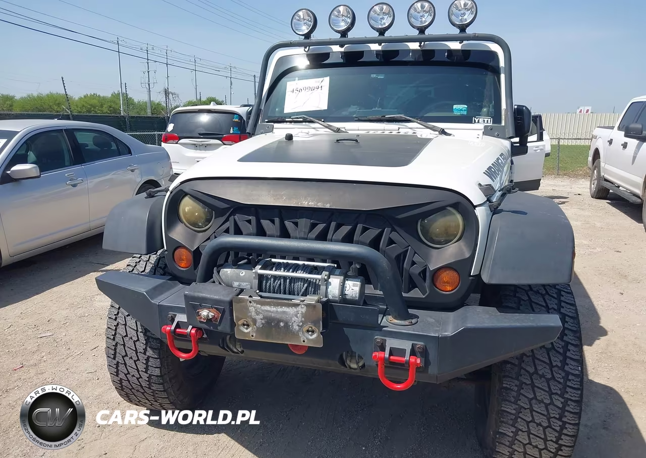 2010 Jeep Wrangler Unlimited Sport VIN:1J4BA3H17AL105150 - 12