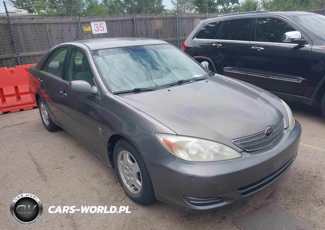 2002 Toyota Camry Le VIN:4T1BF30K82U529200 - 1