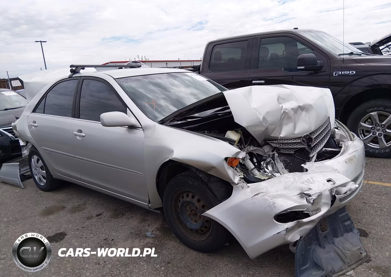 2003 Toyota Camry Le VIN:JTDBE32K030203842 - 14