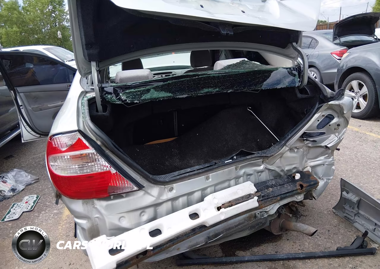 2003 Toyota Camry Le VIN:JTDBE32K030203842 - 6