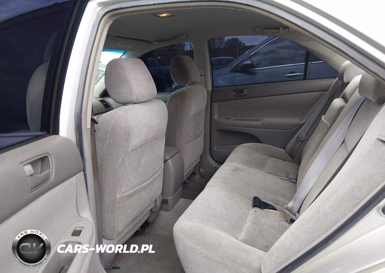 2003 Toyota Camry Le VIN:JTDBE32K030203842 - 8