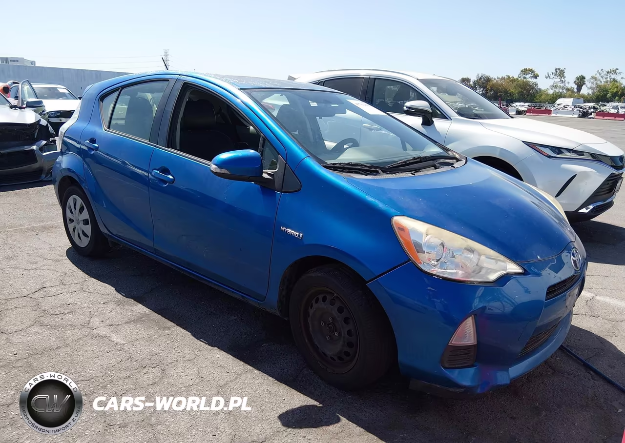 2014 Toyota Prius C Two VIN:JTDKDTB3XE1073271 - 1