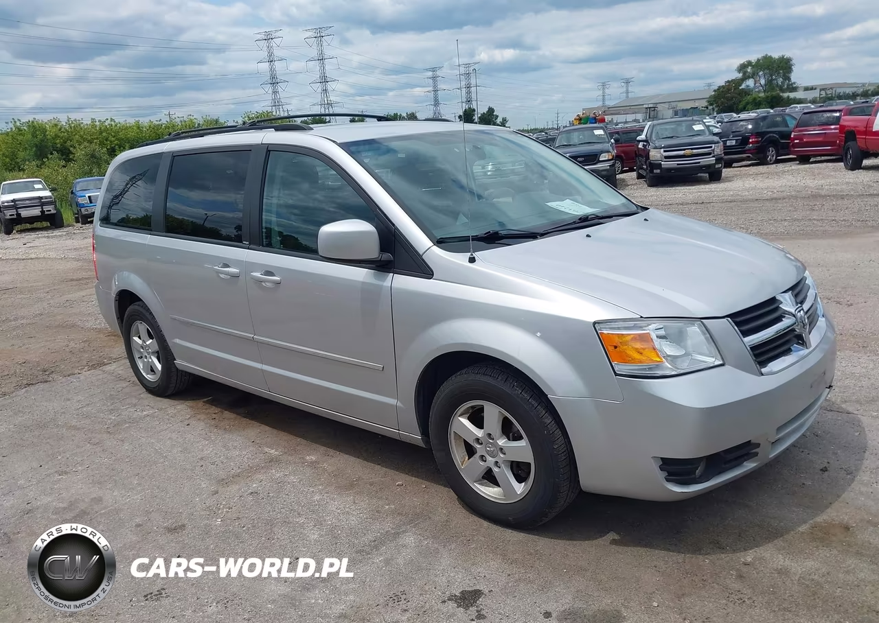 2010 Dodge Grand Caravan Sxt VIN:2D4RN5D10AR121100 - 1