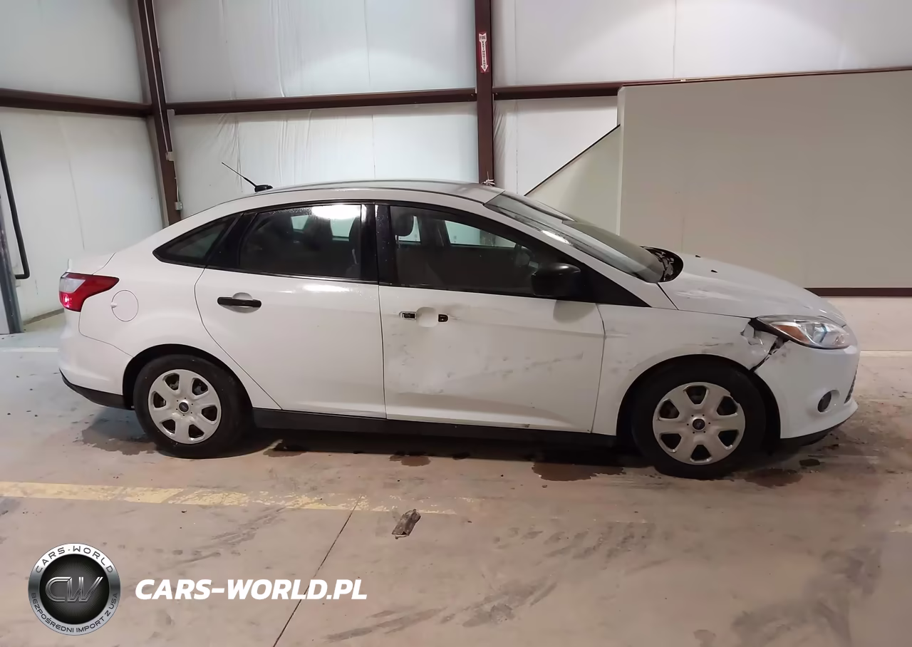 2014 Ford Focus S VIN:1FADP3E20EL323257 - 13