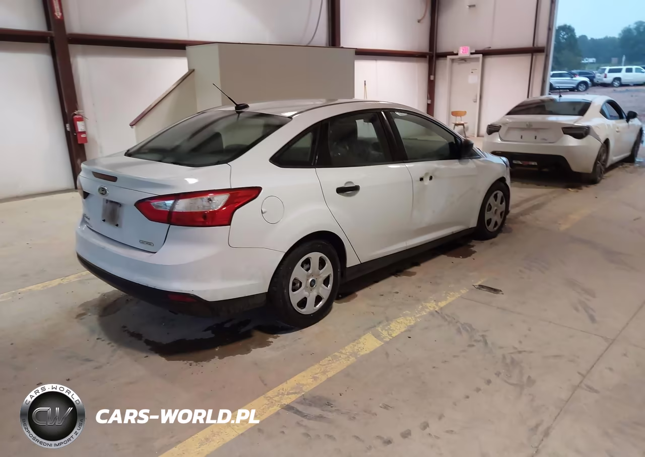 2014 Ford Focus S VIN:1FADP3E20EL323257 - 4