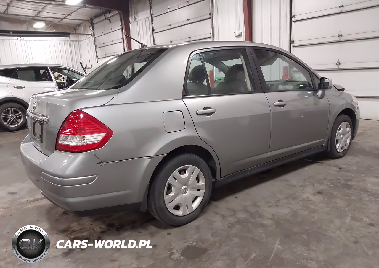 2011 Nissan Versa 1.8S VIN:3N1BC1AP4BL423318 - 4