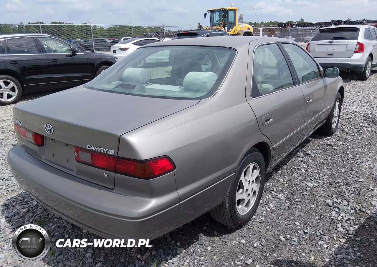 1999 Toyota Camry Le V6 VIN:4T1BF28K1XU085910 - 4