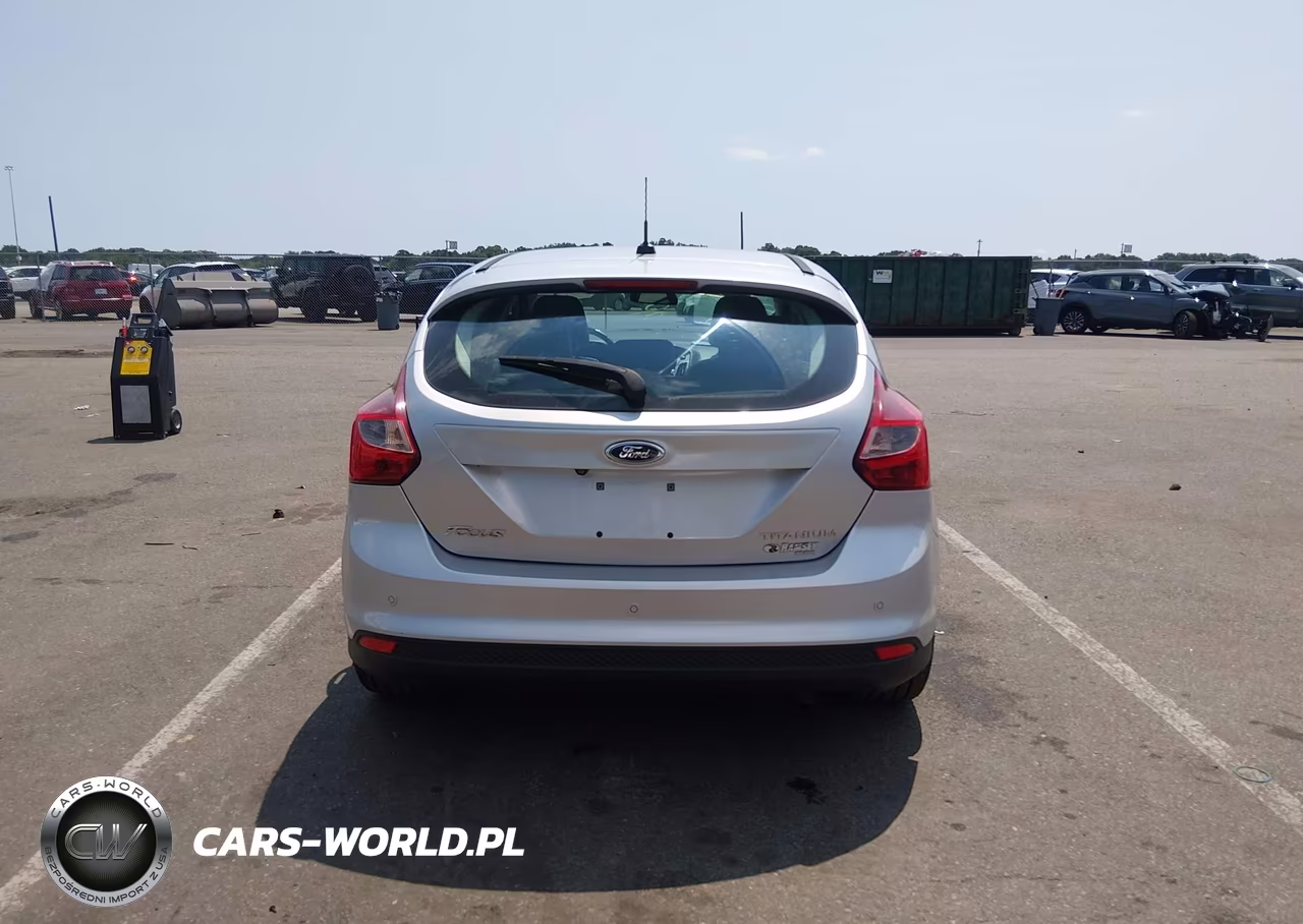 2014 Ford Focus Titanium VIN:1FADP3N26EL146830 - 16