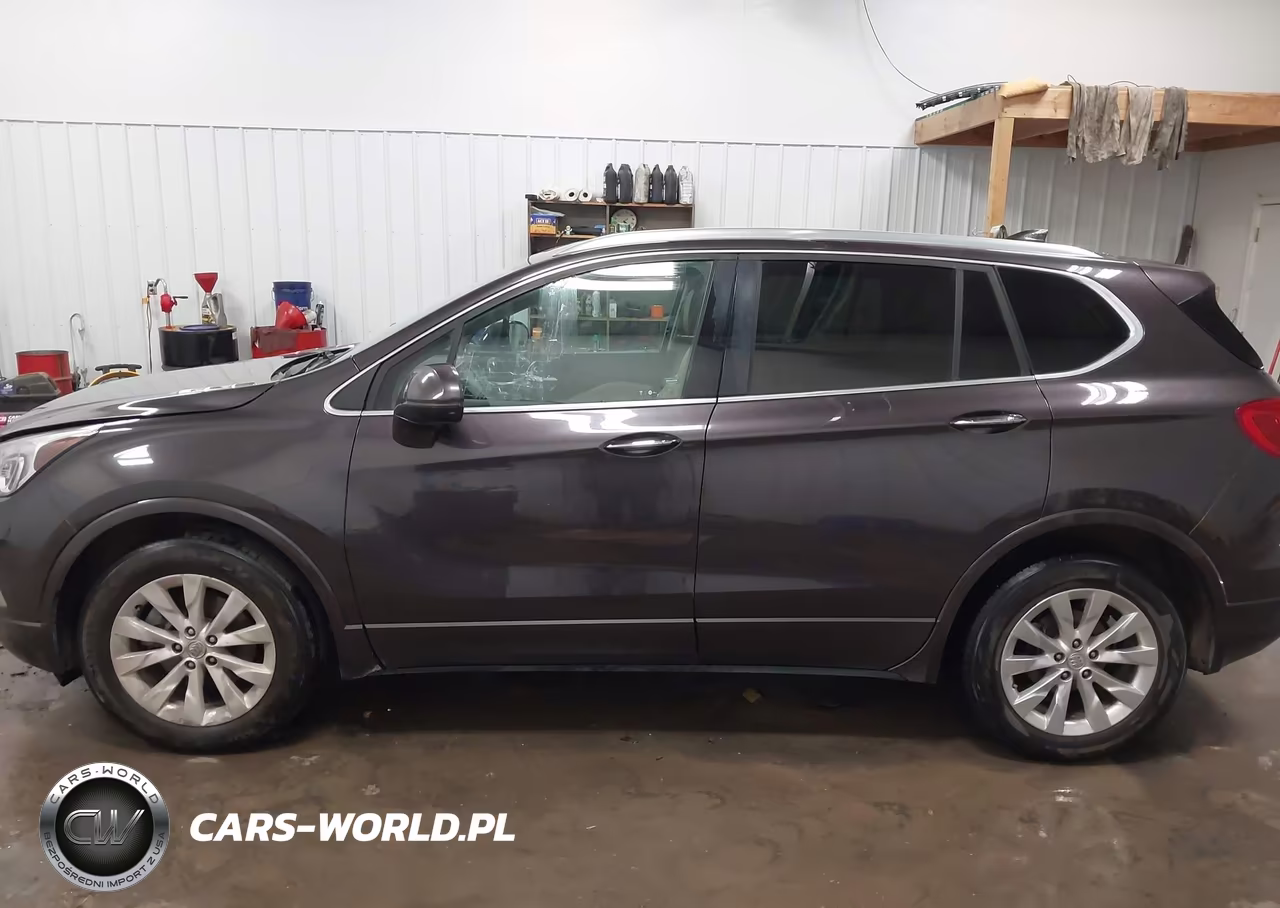 2017 Buick Envision Essence VIN:LRBFXDSA1HD100811 - 14