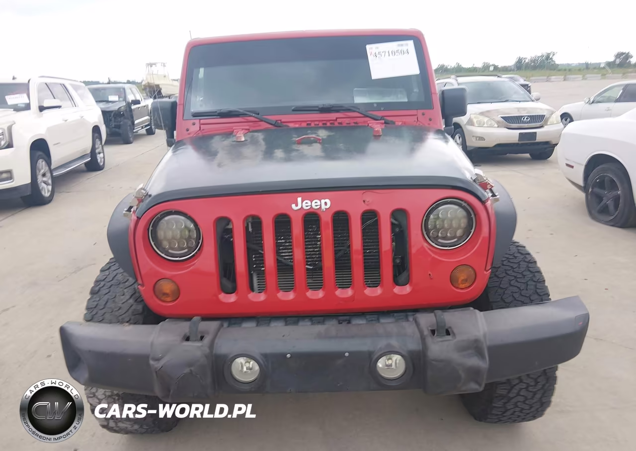 2012 Jeep Wrangler Unlimited Sport VIN:1C4BJWDG9CL141197 - 12