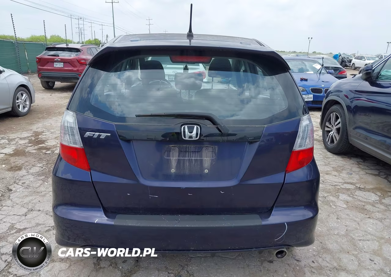 2009 Honda Fit Sport VIN:JHMGE88449S028163 - 16
