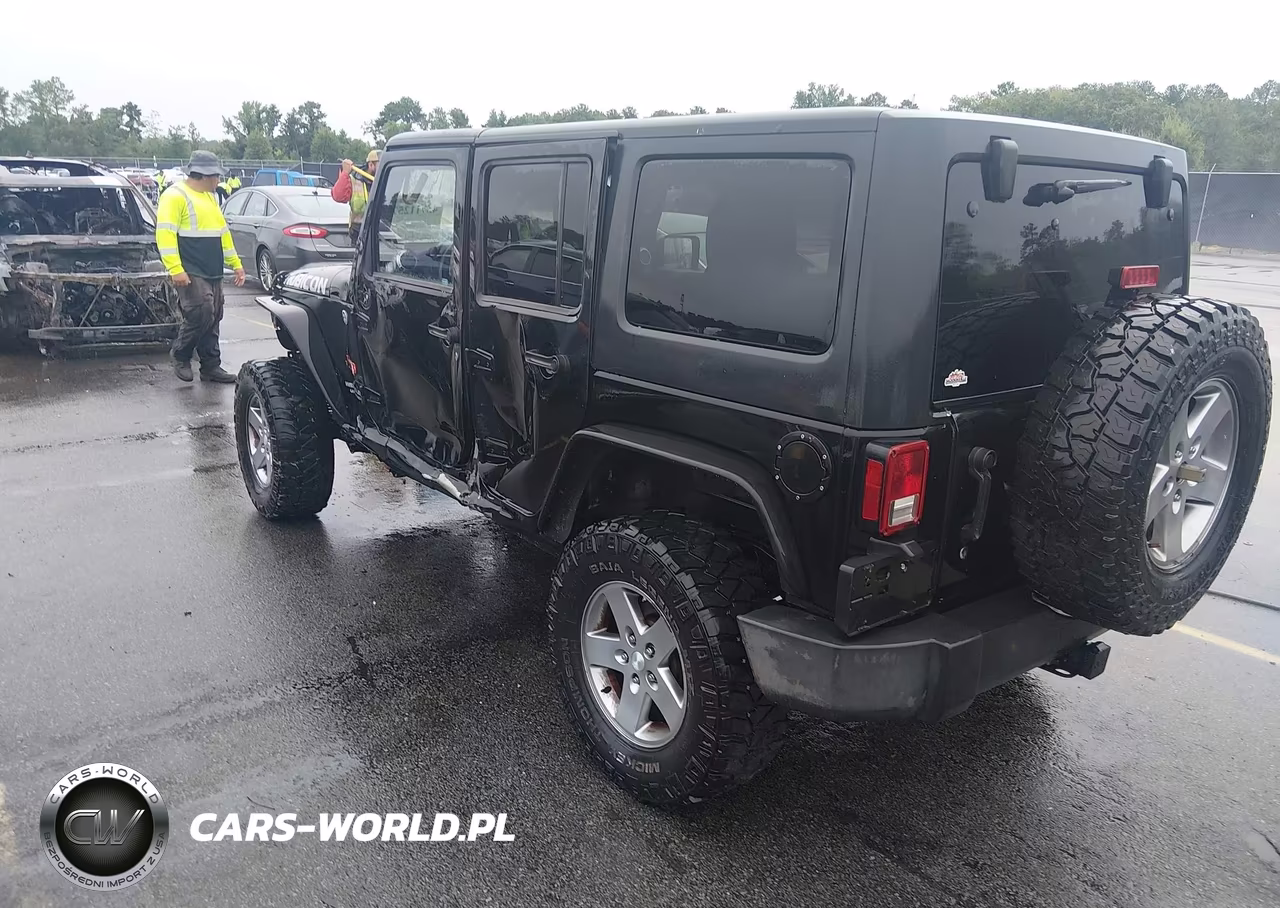 2012 Jeep Wrangler Unlimited Rubicon VIN:1C4BJWFG5CL108064 - 3
