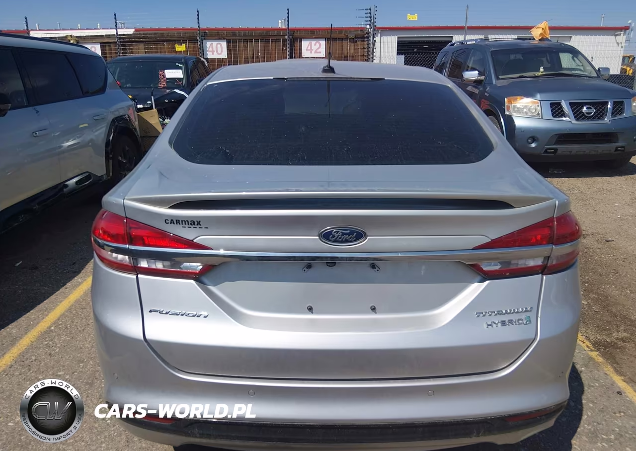2017 Ford Fusion Hybrid Titanium VIN:3FA6P0RU7HR360511 - 16