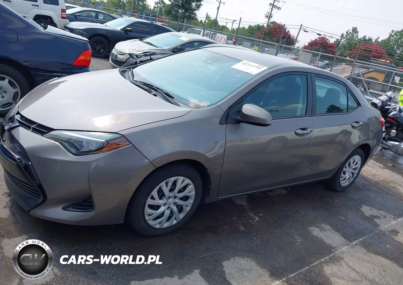 2017 Toyota Corolla Le VIN:5YFBURHE4HP659105 - 14