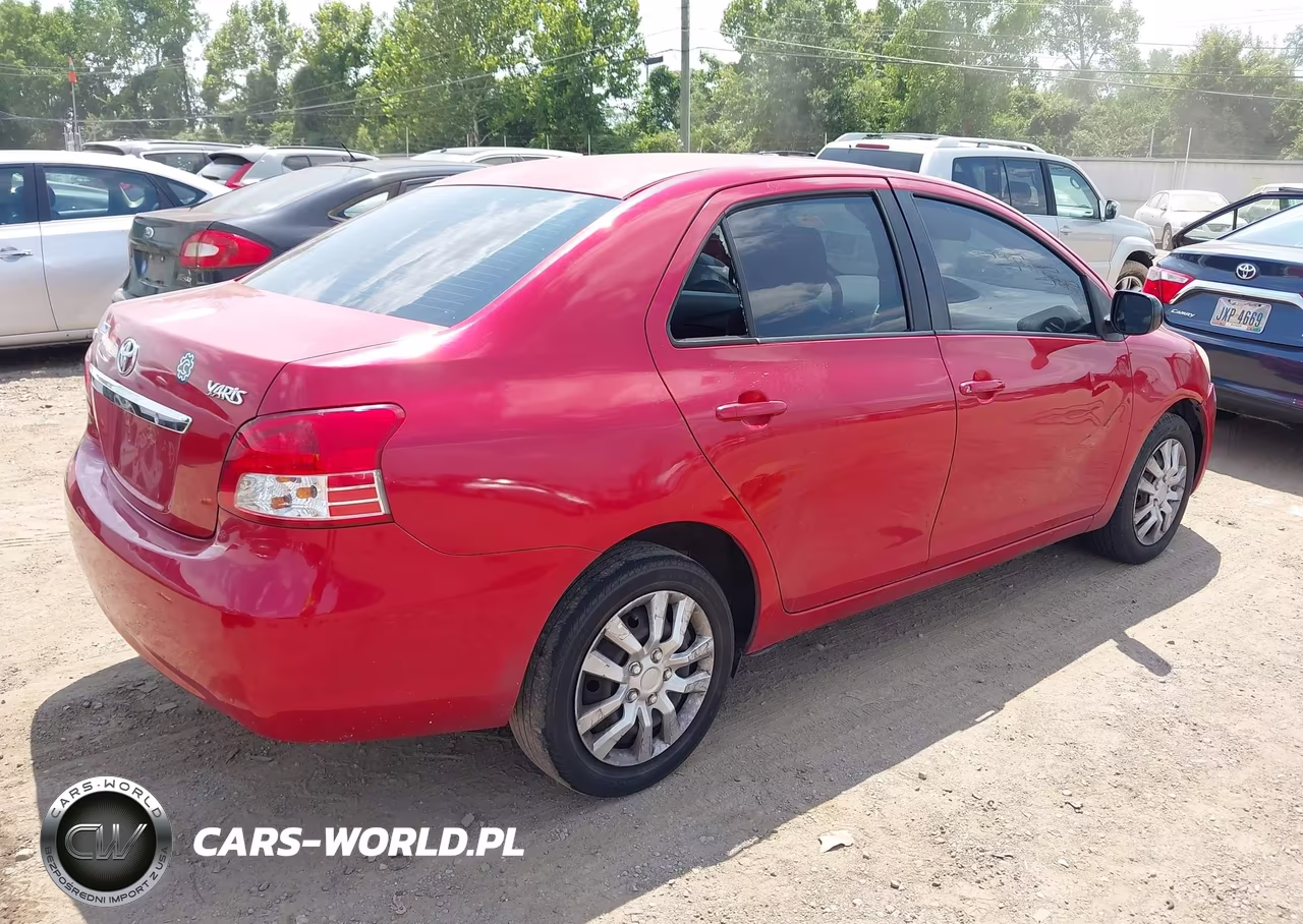 2011 Toyota Yaris VIN:JTDBT4K3XB1402331 - 4