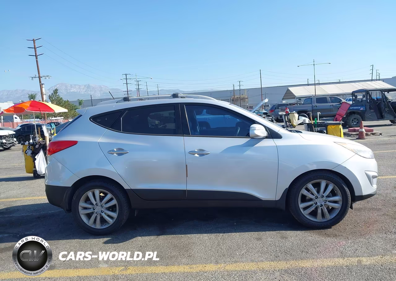 2011 Hyundai Tucson Limited VIN:KM8JU3AC6BU290075 - 14