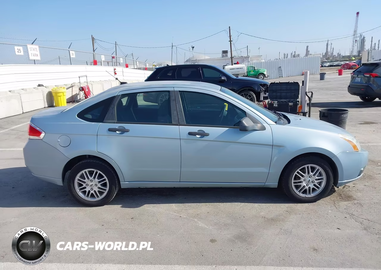 2009 Ford Focus Se VIN:1FAHP35N49W264116 - 13