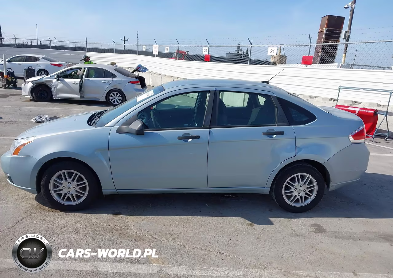2009 Ford Focus Se VIN:1FAHP35N49W264116 - 14