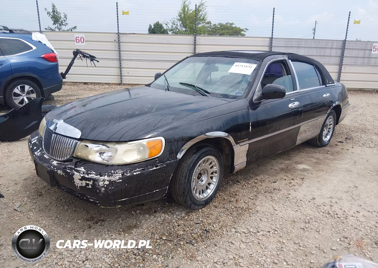 2001 Lincoln Town Car Cartier VIN:1LNHM83W31Y700874 - 2