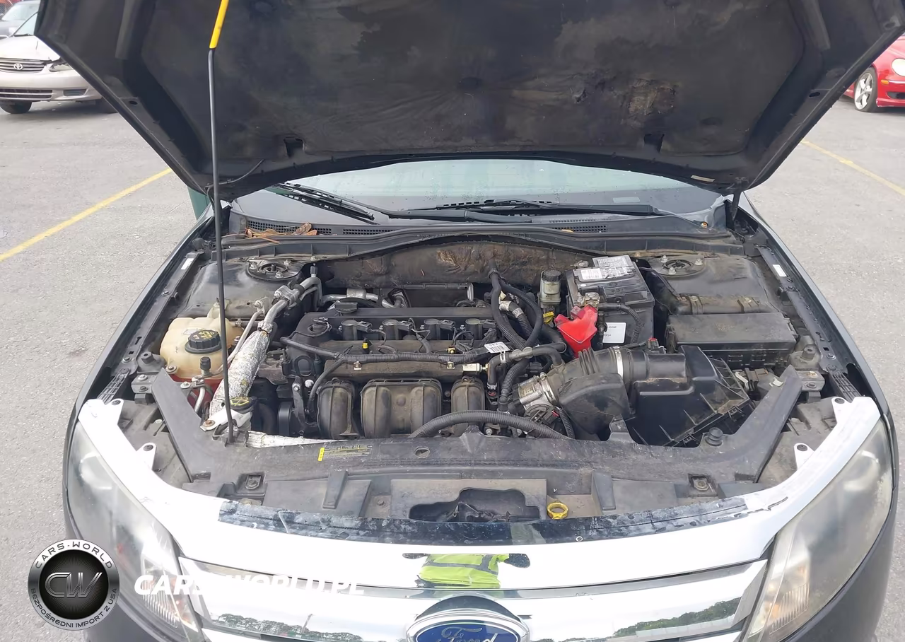 2012 Ford Fusion S VIN:3FAHP0GAXCR349528 - 10