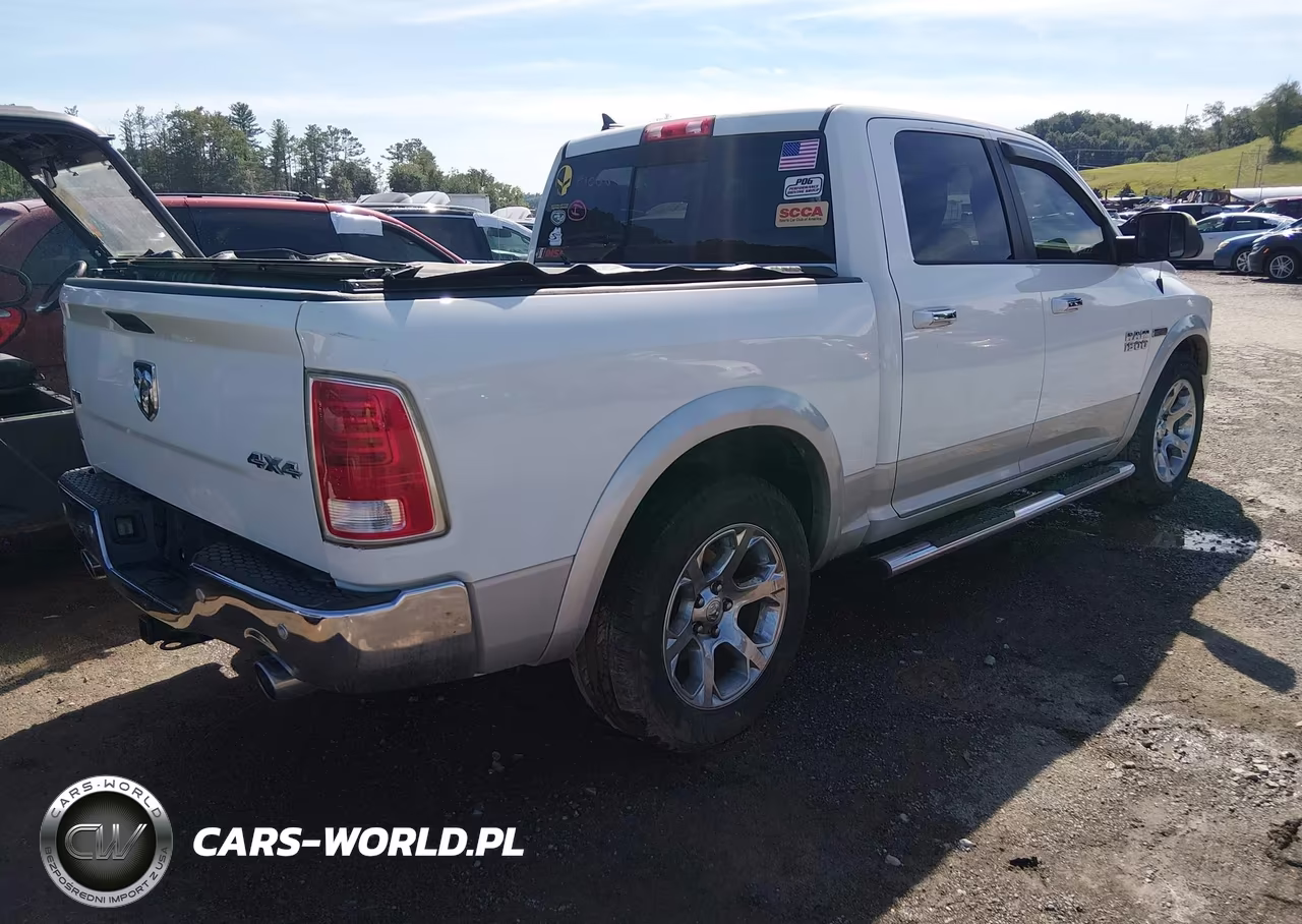 2015 Ram 1500 Laramie VIN:1C6RR7NM1FS513912 - 4