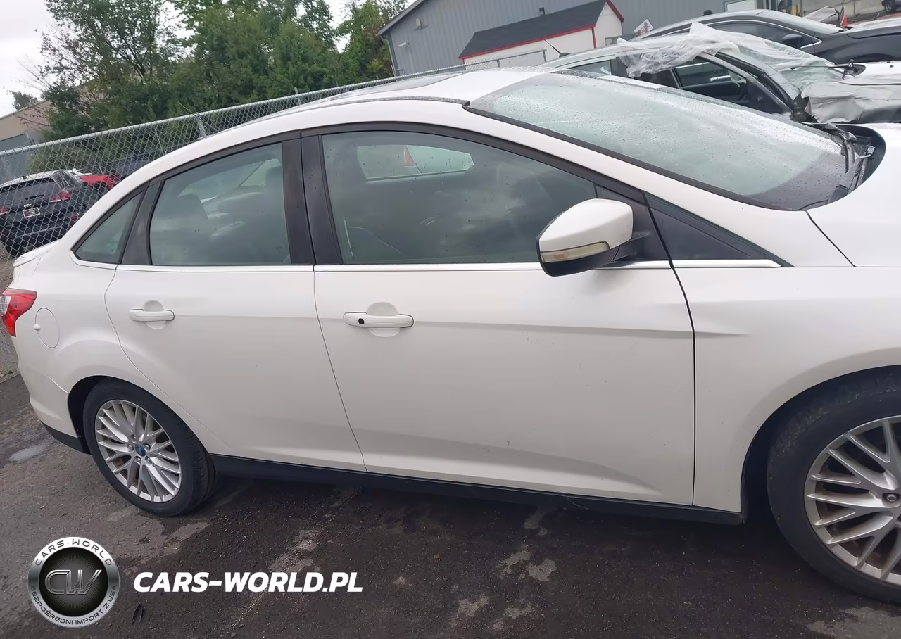 2013 Ford Focus Titanium VIN:1FADP3J20DL113603 - 14