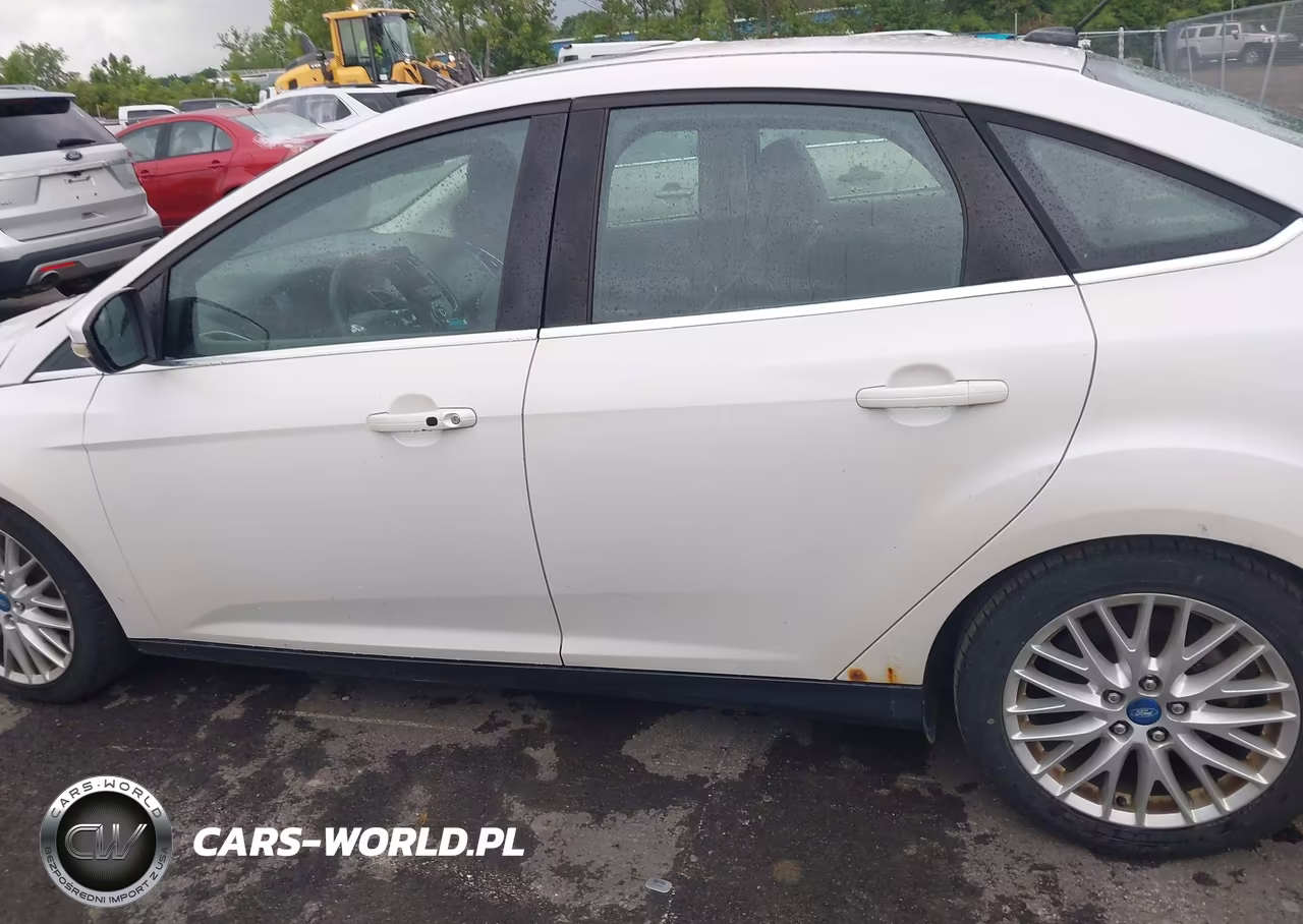 2013 Ford Focus Titanium VIN:1FADP3J20DL113603 - 15