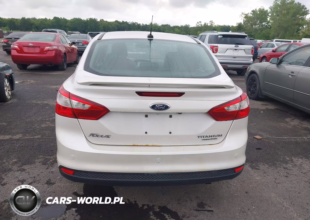 2013 Ford Focus Titanium VIN:1FADP3J20DL113603 - 17