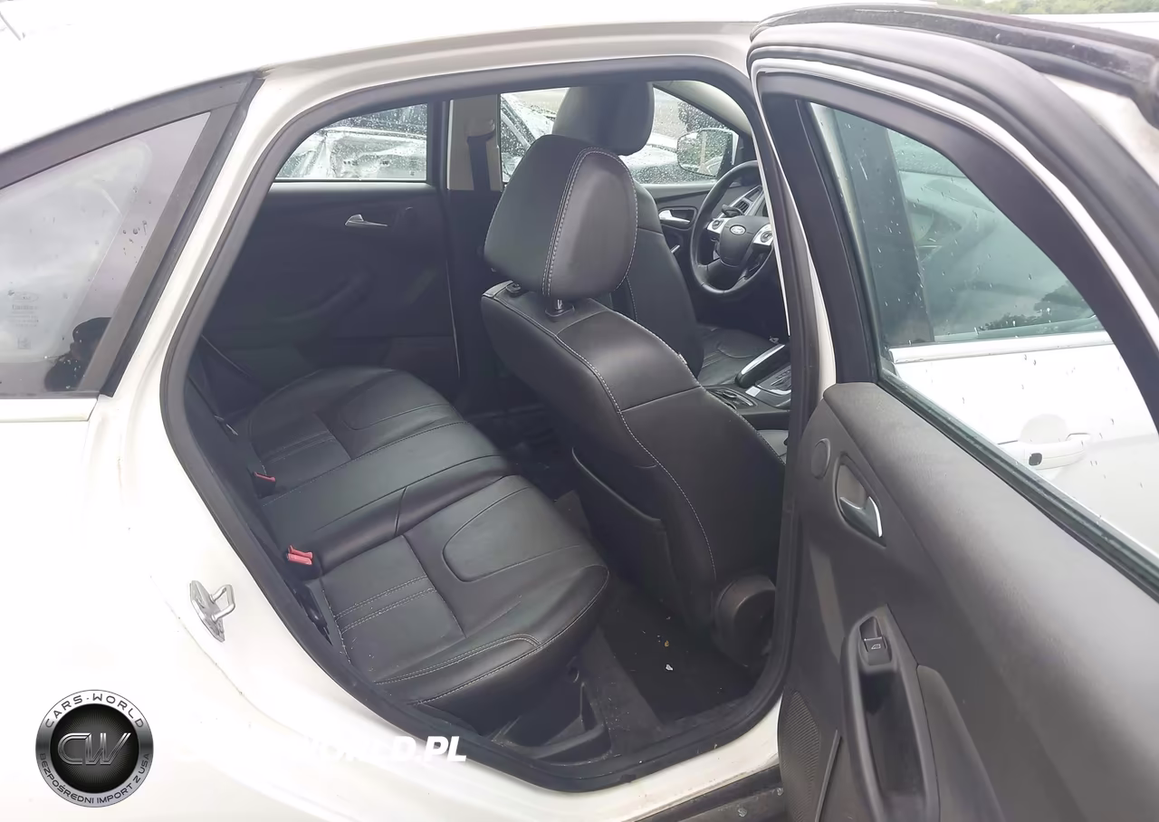 2013 Ford Focus Titanium VIN:1FADP3J20DL113603 - 8