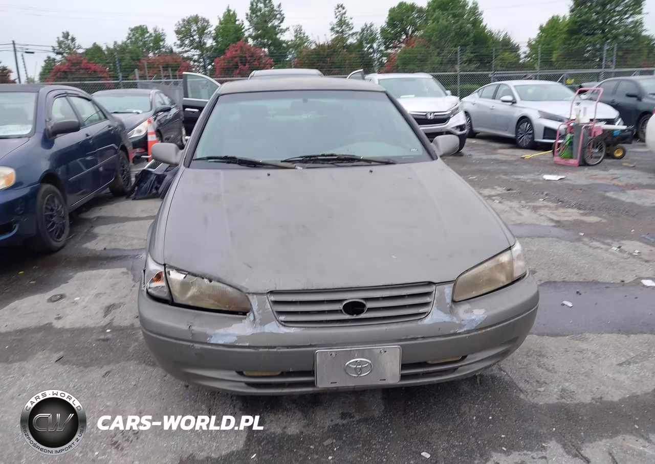 1999 Toyota Camry Le VIN:4T1BG22K9XU577929 - 12