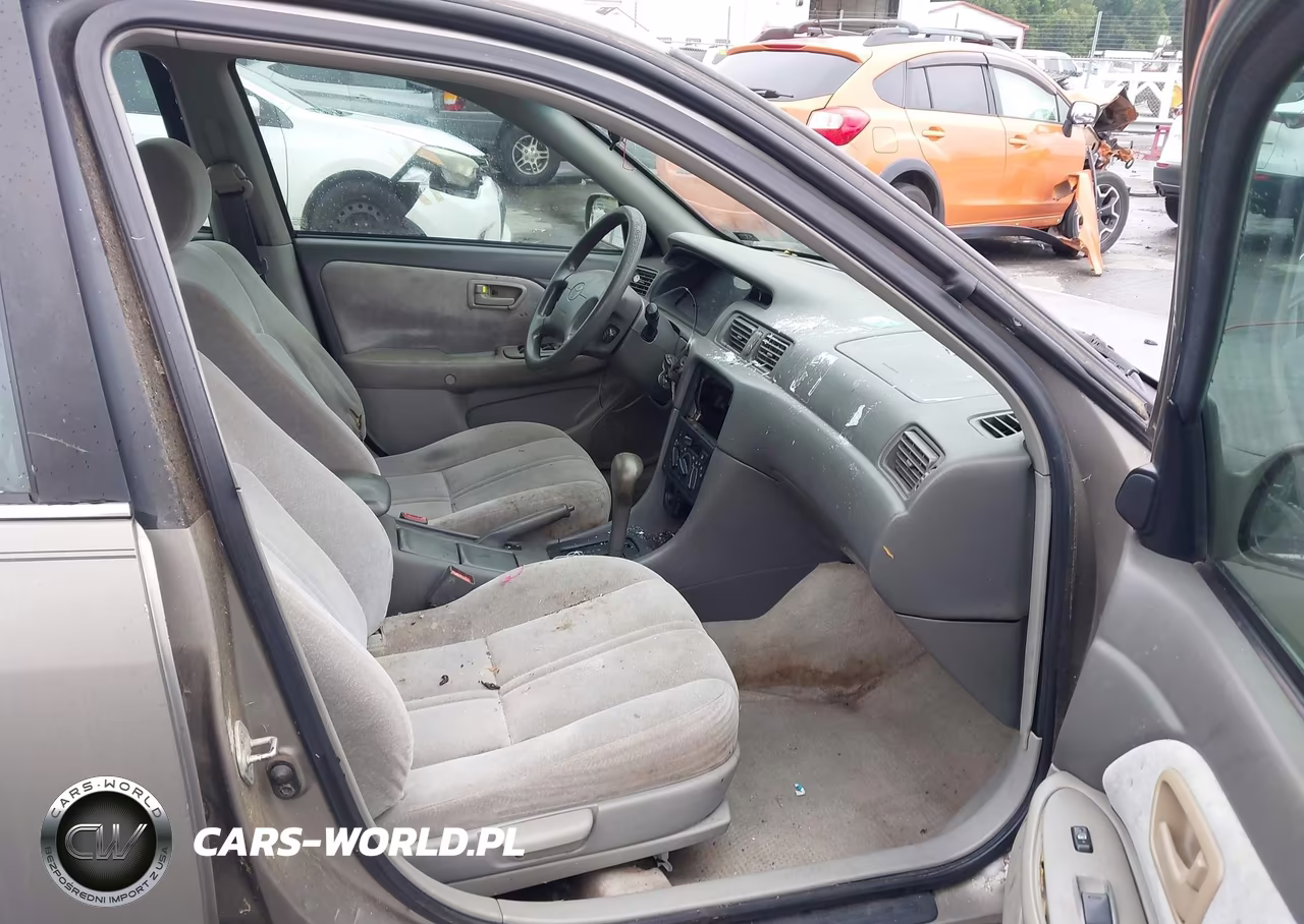 1999 Toyota Camry Le VIN:4T1BG22K9XU577929 - 5