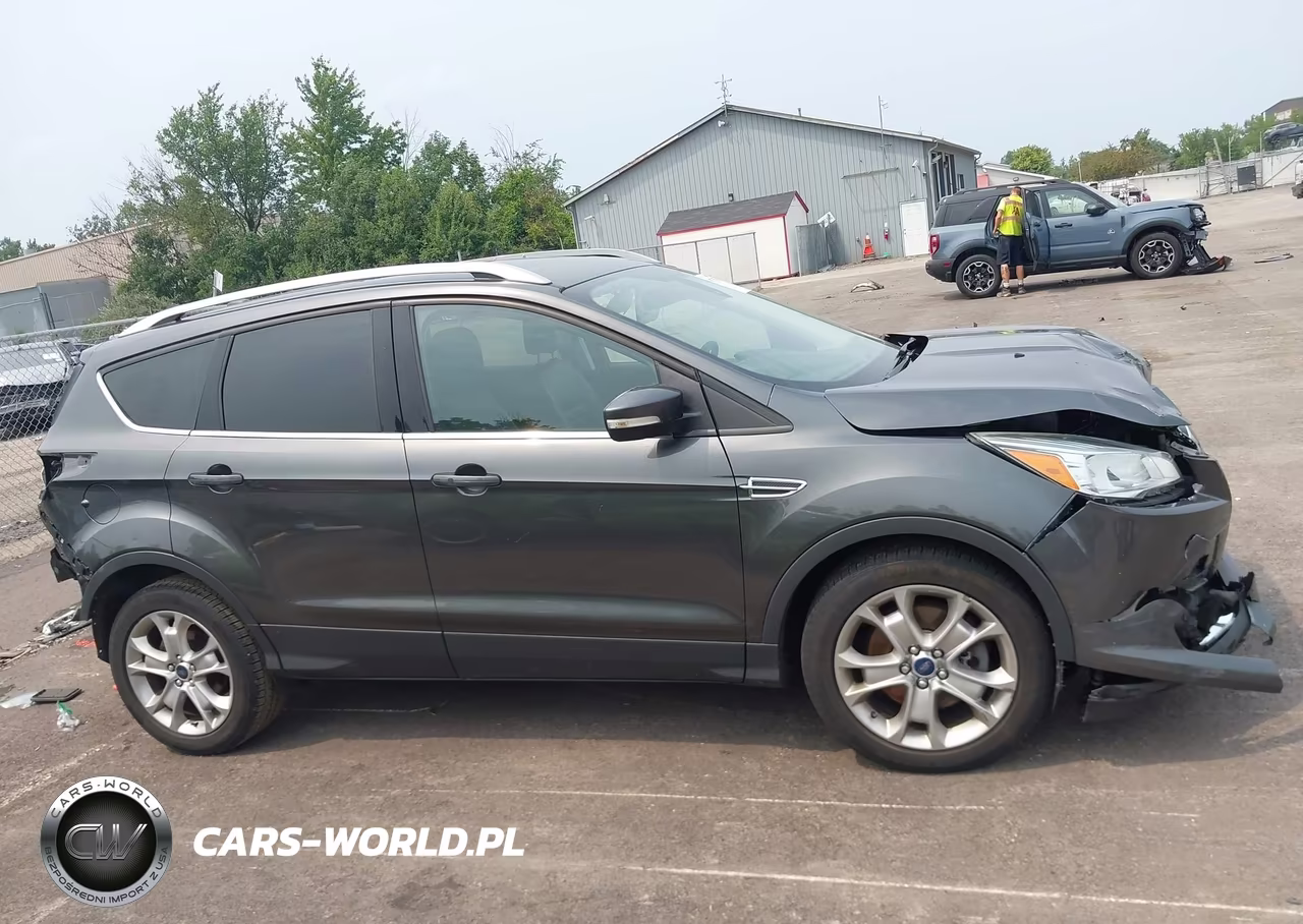 2016 Ford Escape Titanium VIN:1FMCU9J95GUB12889 - 14