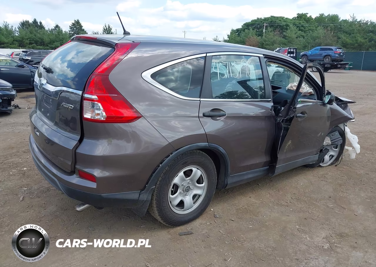 2015 Honda Cr-V Lx VIN:2HKRM4H39FH699318 - 4