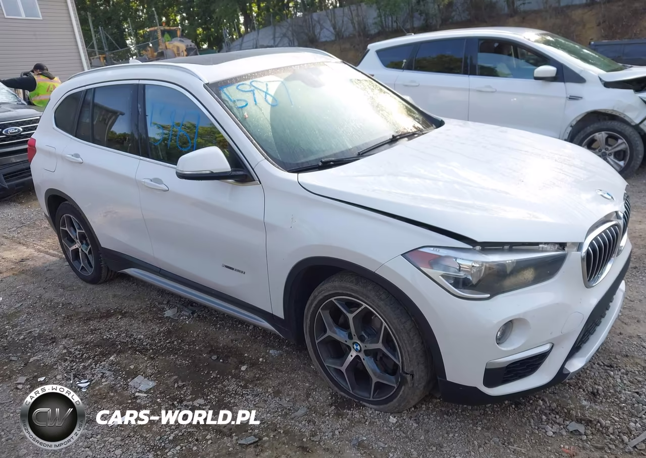 2018 BMW X1 xDrive28I VIN:WBXHT3C31J5K21678 - 1