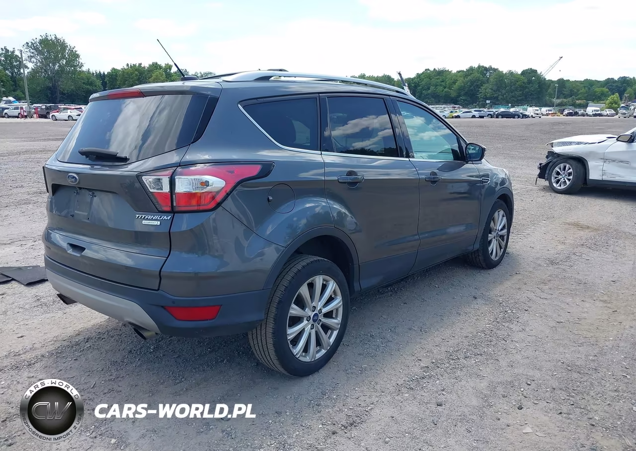2017 Ford Escape Titanium VIN:1FMCU0JD3HUD45381 - 4