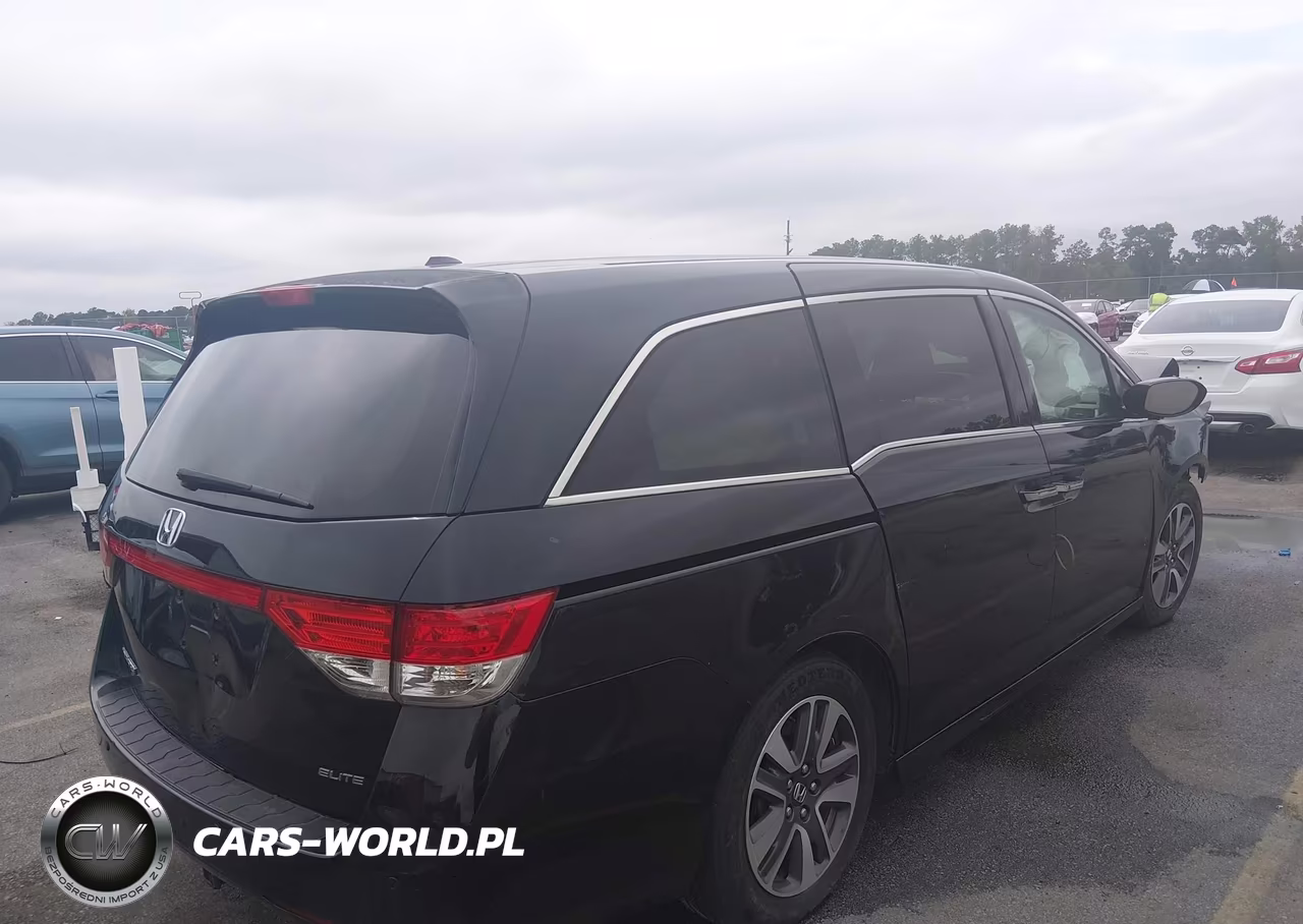 2014 Honda Odyssey Touring-Touring Elite VIN:5FNRL5H90EB045432 - 4