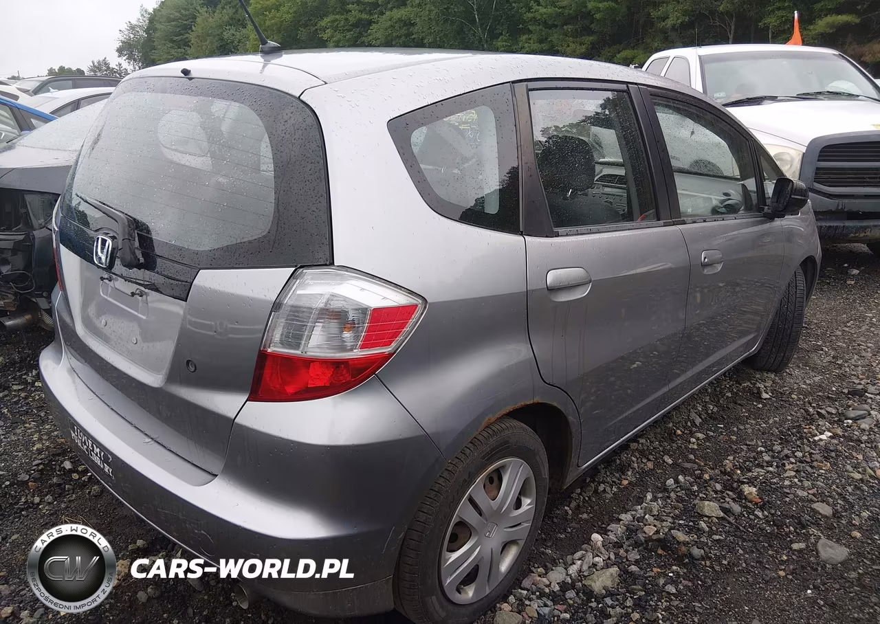 2009 Honda Fit VIN:JHMGE88229S032467 - 4