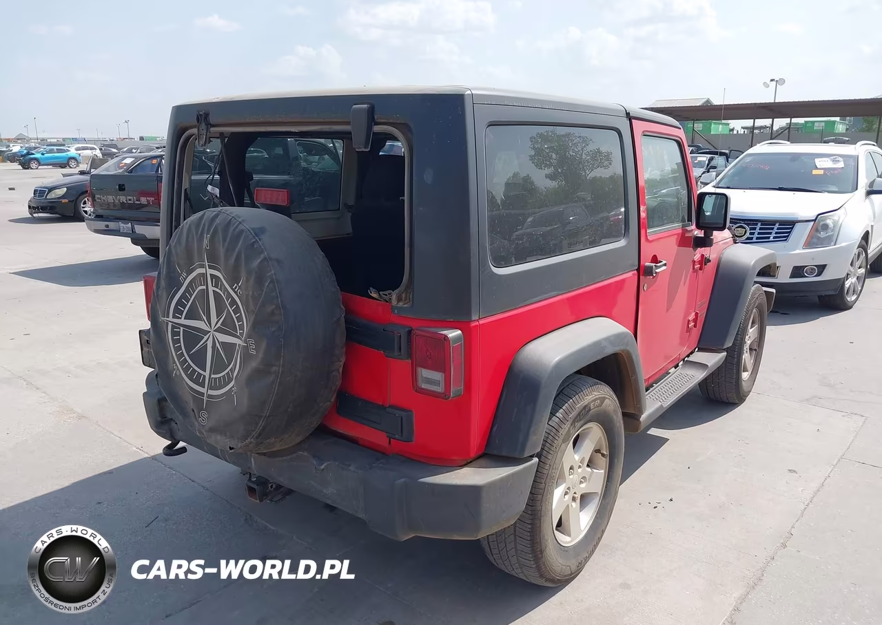 2015 Jeep Wrangler Sport VIN:1C4GJWAG7FL598069 - 4