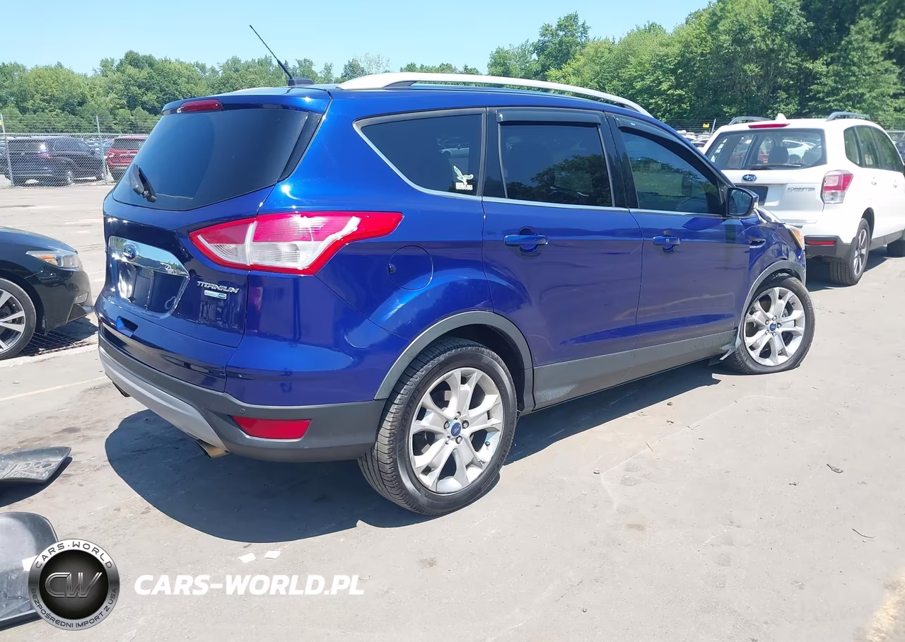 2016 Ford Escape Titanium VIN:1FMCU9J97GUC90495 - 4