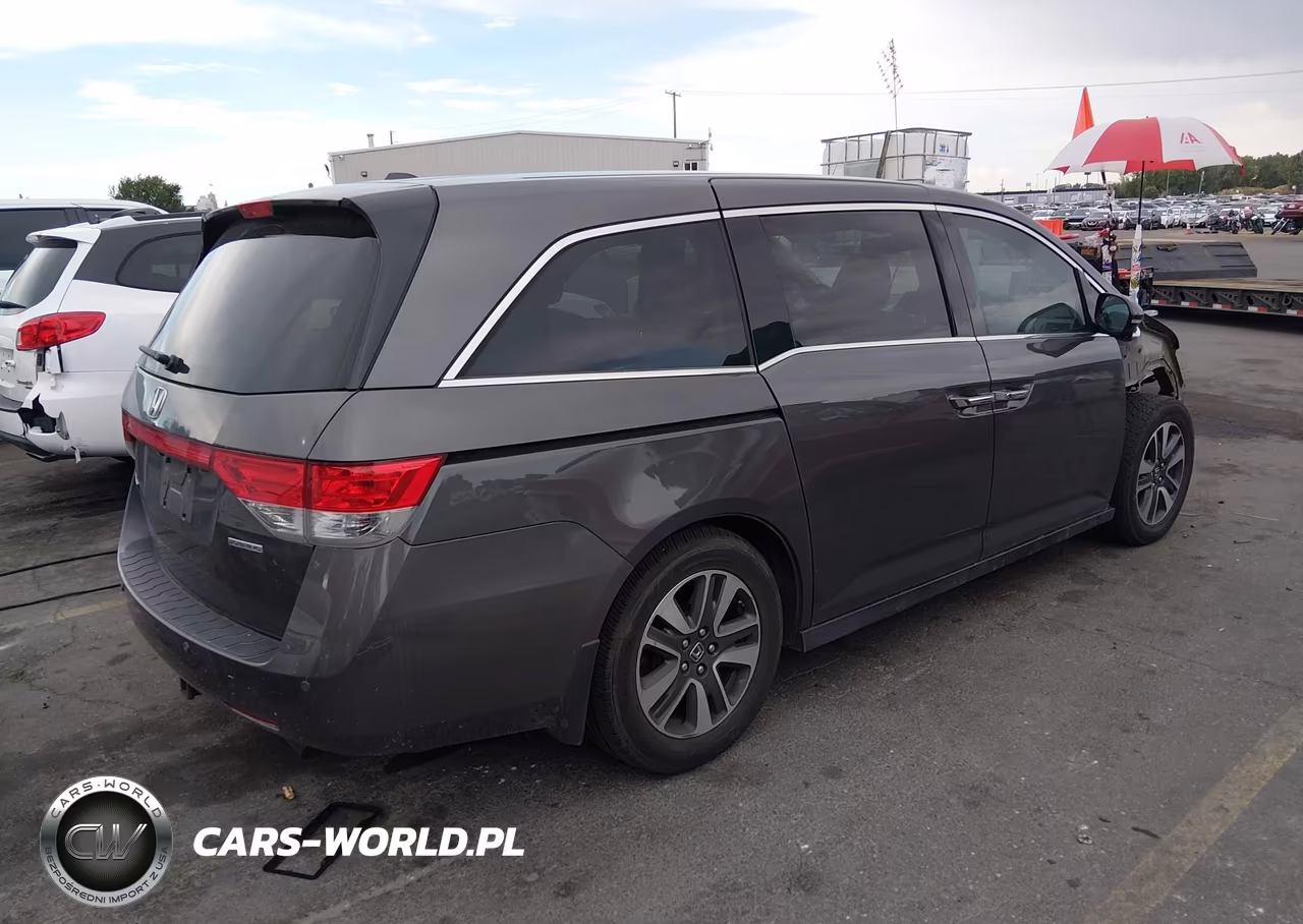 2015 Honda Odyssey Touring-Touring Elite VIN:5FNRL5H95FB050045 - 4