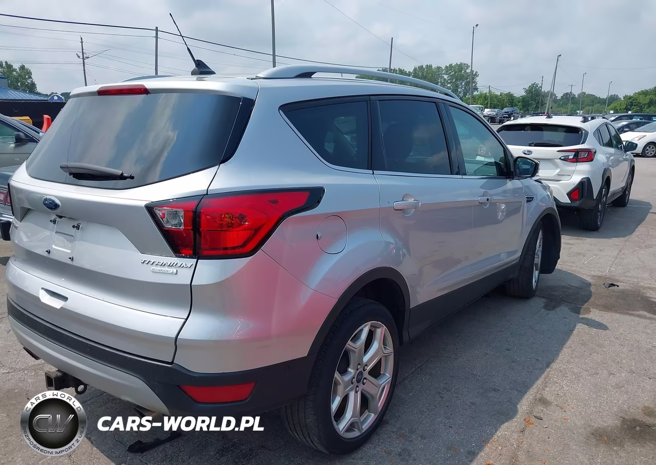 2019 Ford Escape Titanium VIN:1FMCU0J95KUB76256 - 4