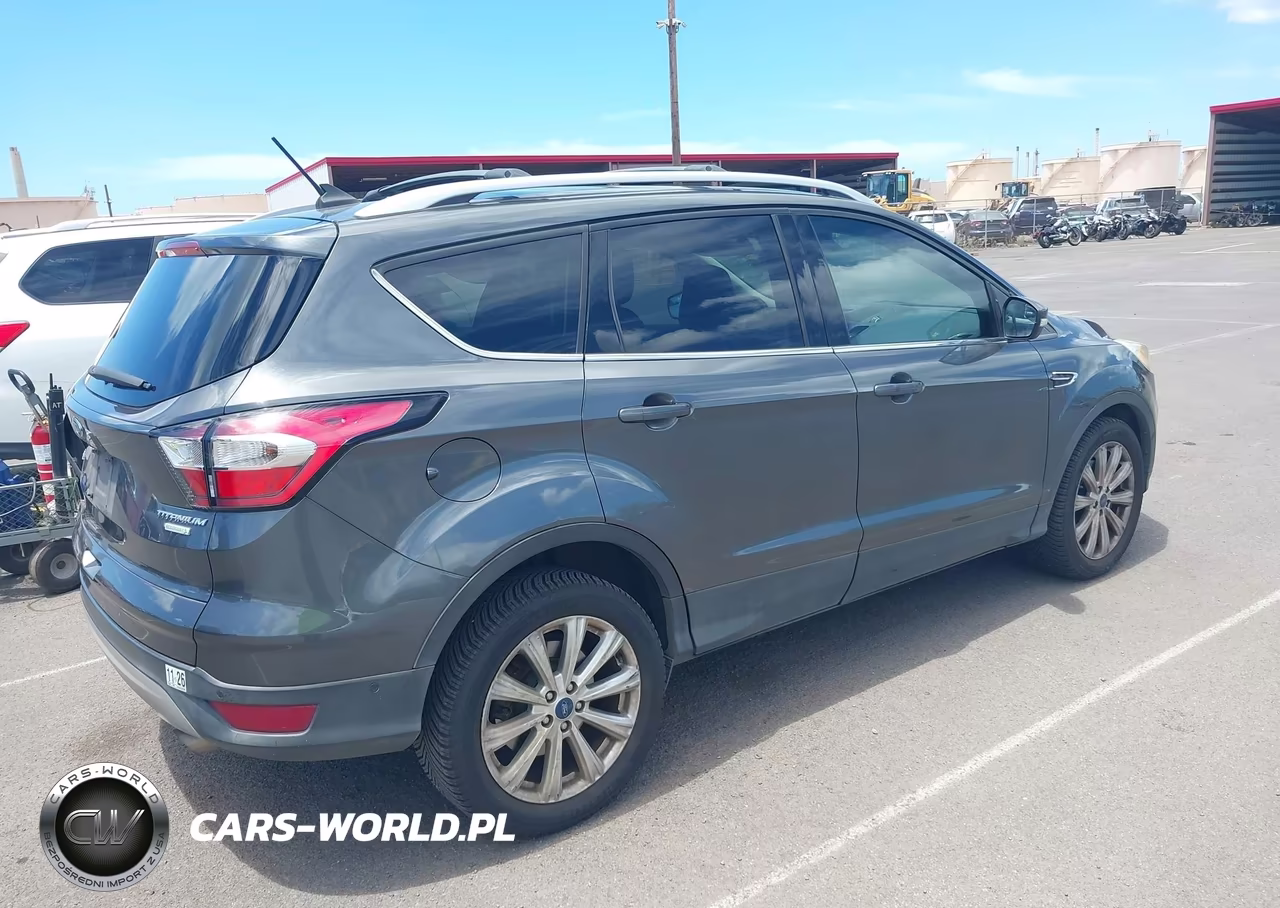 2018 Ford Escape Titanium VIN:1FMCU0J91JUB28090 - 4