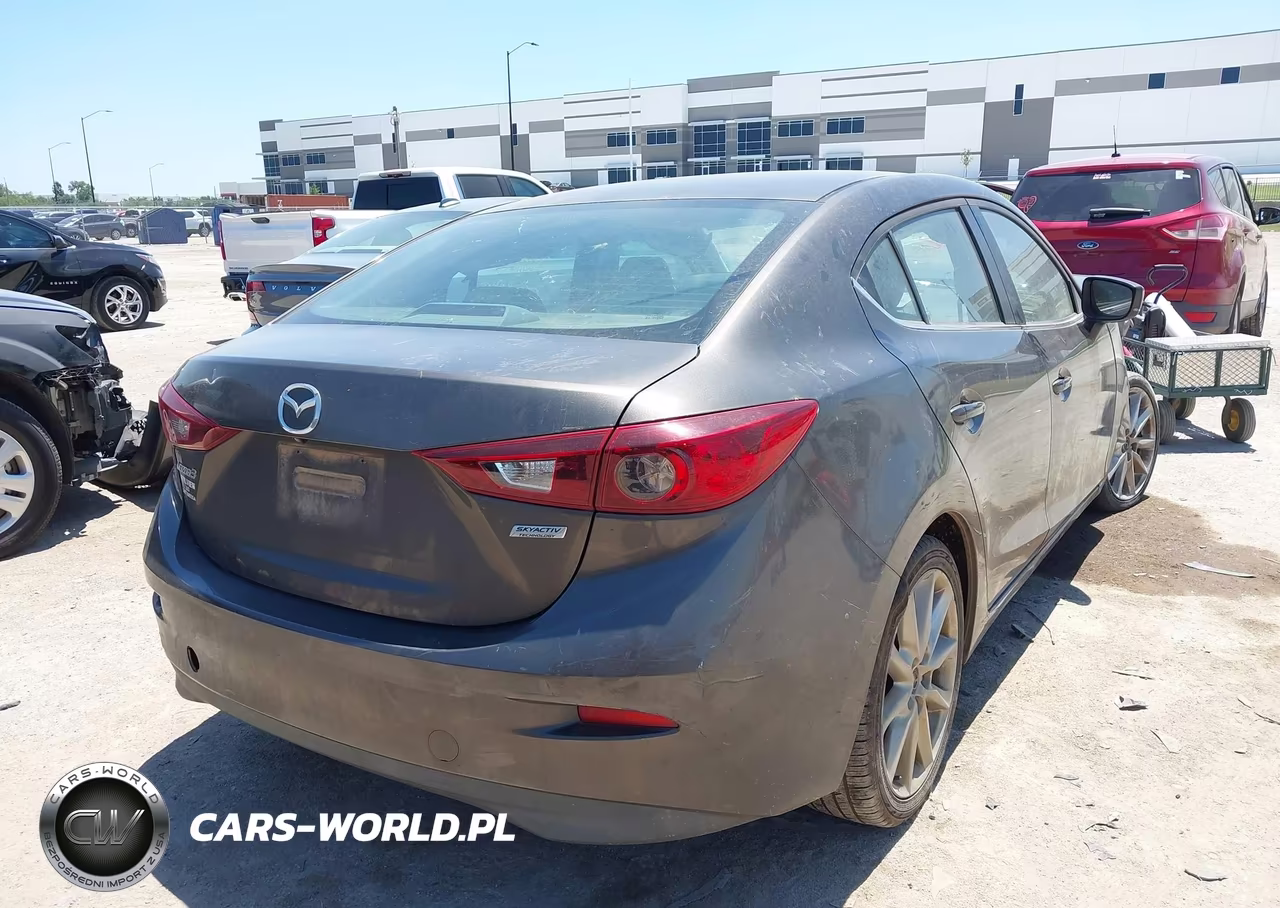 2017 Mazda Mazda3 Touring VIN:3MZBN1V79HM106393 - 4