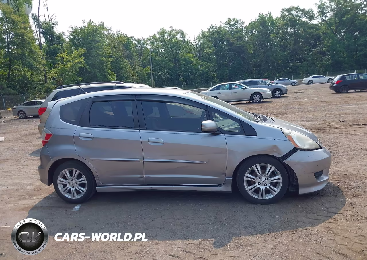 2009 Honda Fit Sport VIN:JHMGE88429S065423 - 13