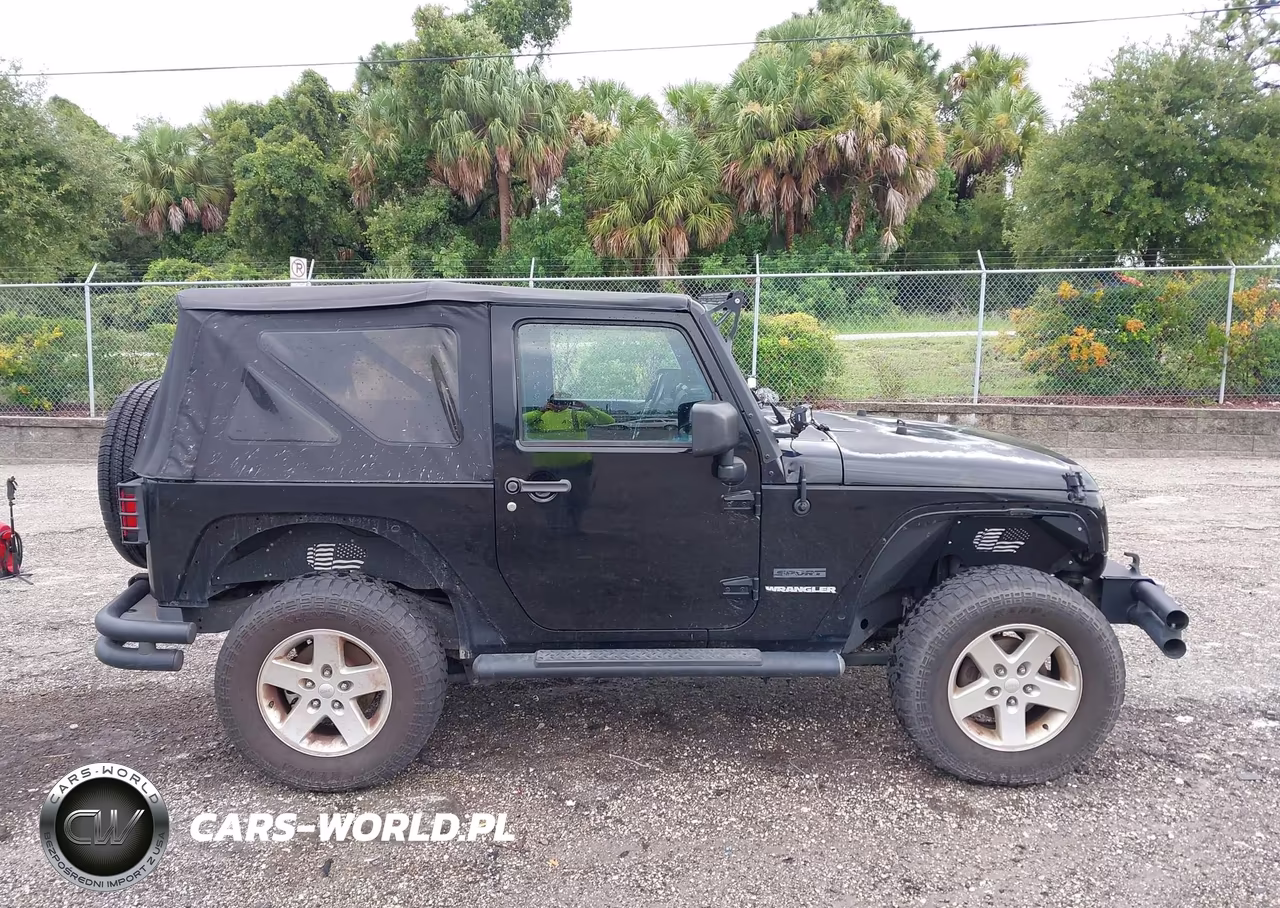 2011 Jeep Wrangler Sport VIN:1J4AA2D12BL579570 - 13
